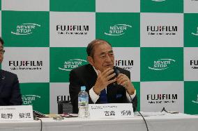 Fujifilm HD Chairman Komori emphasizes the significance of the acquisition.